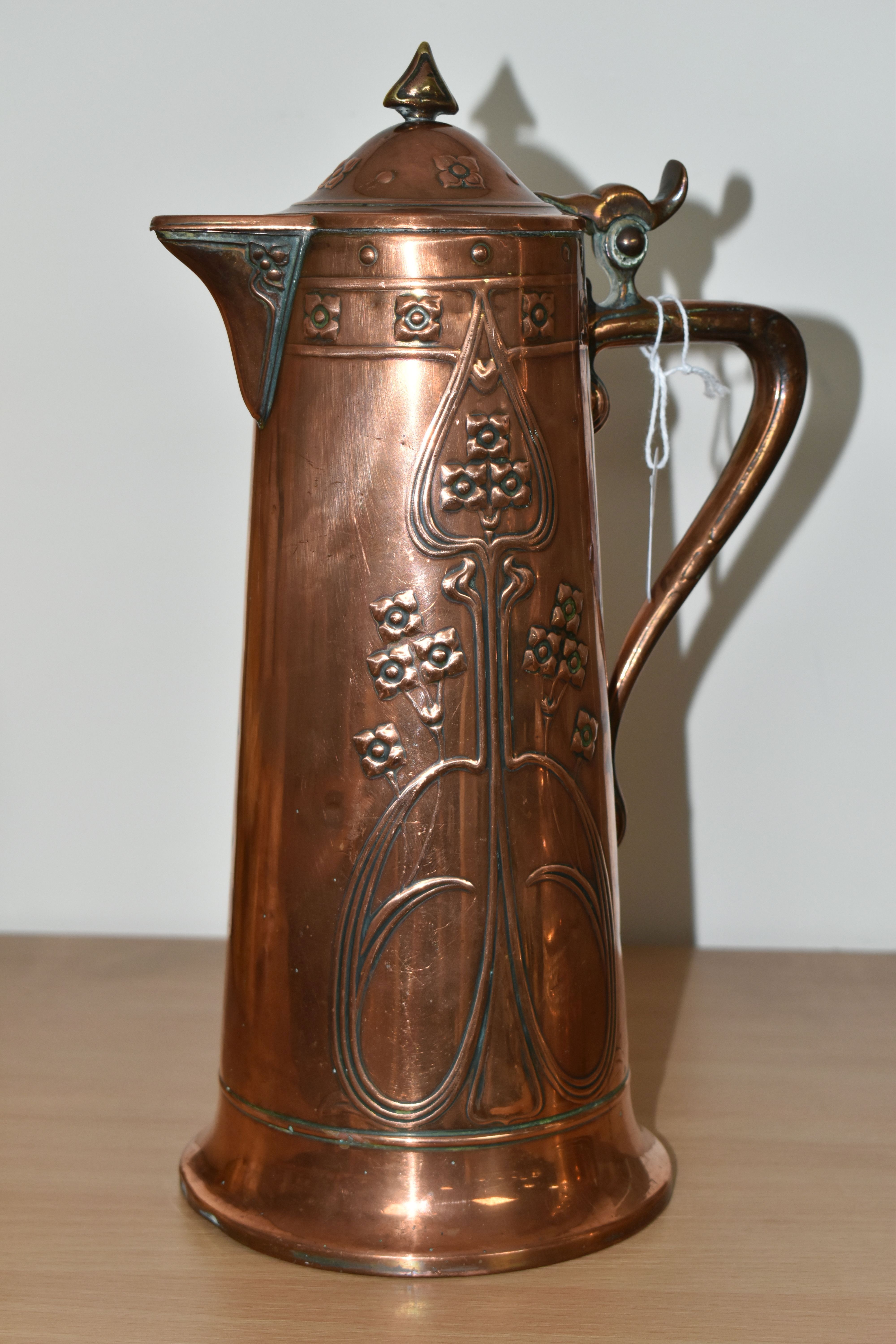 AN ART NOUVEAU COPPER JUG BY JOSEPH SANKEY & SONS, of covered tapering form, with stylised Art