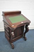 A MODERN MAHOGANY DAVENPORT, with a green writing surface, with an arrangement of drawers, width