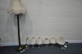 A SELECTION OF LIGHTING, to include a mahogany standard lamp, five various table lamps, all with