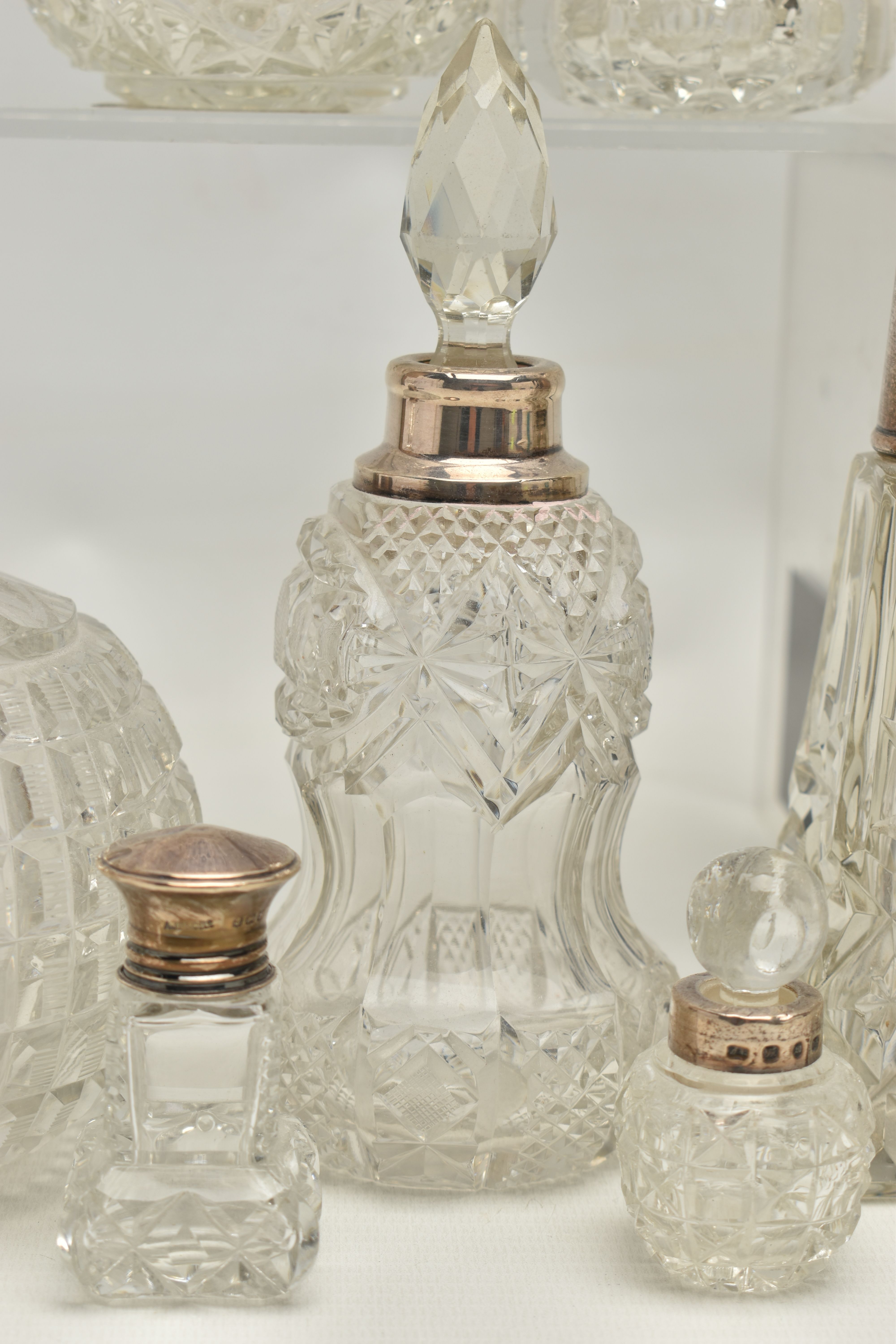 FOURTEEN LATE 19TH AND EARLY 20TH CENTURY SILVER MOUNTED SCENT BOTTLES, various shapes and sizes - Image 3 of 10