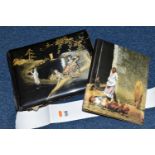 TWO POSTCARD ALBUMS containing approximately eighty-three early 20th century postcards, album one