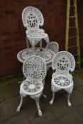 A WHITE PAINTED ALUMINIUM CIRCULAR GARDEN TABLE, diameter 76cm x height 70cm and four chairs (