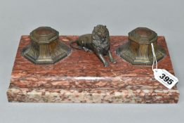 A ROUGE MARBLE INK STAND FEATURING A LION, the twin inkwells and cast lion surmount a red marble