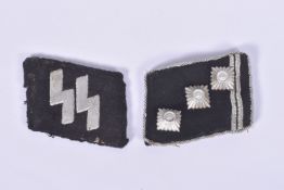 A PAIR OF NAZI GERMANY SSUNIFORM COLLAR TABS, these are black and silver, one features the three