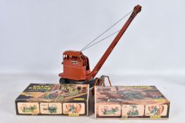 A UNBOXED AND PLAYWORN TRI-ANG JONES KL44 CRANE, red painted with a black base, in need of re-