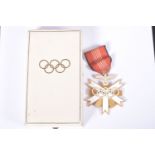 A CASED 1936 BERLIN OLYMPICS MEDAL/AWARD, this is the second class version and was issue to