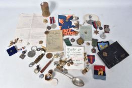 A SELECTION OF BRITISH AND FRENCH MILITARY RELATED ITEMS, to include, three WWII medals, safe