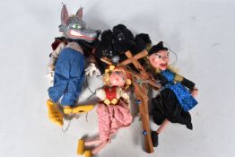 FOUR UNBOXED PELHAM PUPPETS, SL63 Big Bad Wolf, SM Witch, SS Tyrolean Girl and LA Black Poodle, Wolf