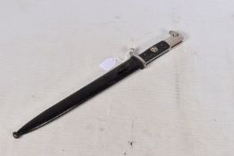 A GERMAN DRESS DAGGER MADE BY WKC, this has the black grip and black scabbard, the blade has no