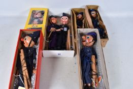 SEVEN BOXED PELHAM POLICEMAN PUPPETS, three SS including one of the whistling versions and four
