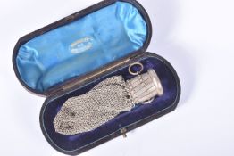 A 1936 BERLIN OLYMPICS COIN PURSE, this was produced as a souvenir for summer Olympics, its white
