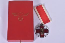 A GERMAN CROSS OF HONOUR OF THE GERMAN RED CROSS, this features a loop at the top and a length of
