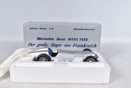 A BOXED CMC SOLITAIR MODELL MERCEDES BENZ W154 1938 1:18 MODEL VEHICLE, numbered to the swing tag