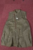A WWII DATED 1942 AIRBORNE LONG OVERSMOCK, this is sleeveless and green in colour, this features the