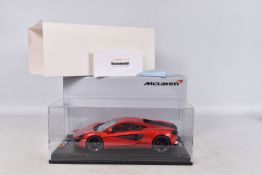 A BOXED TECNOMODEL EXCLUSIVE COLLECTION MCLAREN 570S 1:18 MODEL VEHICLE, numbered T18-EX02C, in