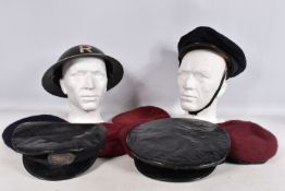 A 1939 DATED WWII STEEL HELMET AND OTHERS, to include six berets and three other hats, the steel