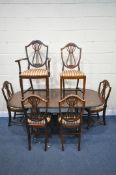 A 20TH CENTURY MAHOGANY OVAL EXTENDING DINING TABLE, with one additional leaf, on splayed legs,