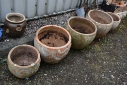 THREE LARGE TERRACOTTA GARDEN POTS, diameter 50cm x height 40cm, along with a pair of smaller