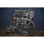 AN ACE EQUIPMENT FOLDING WHEELCHAIR with two footrests