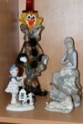 A GROUP OF FIGURINES, comprising a Lladro 'Girl With wheelbarrow and lamb' 4816, a Lladro Daisa 4670