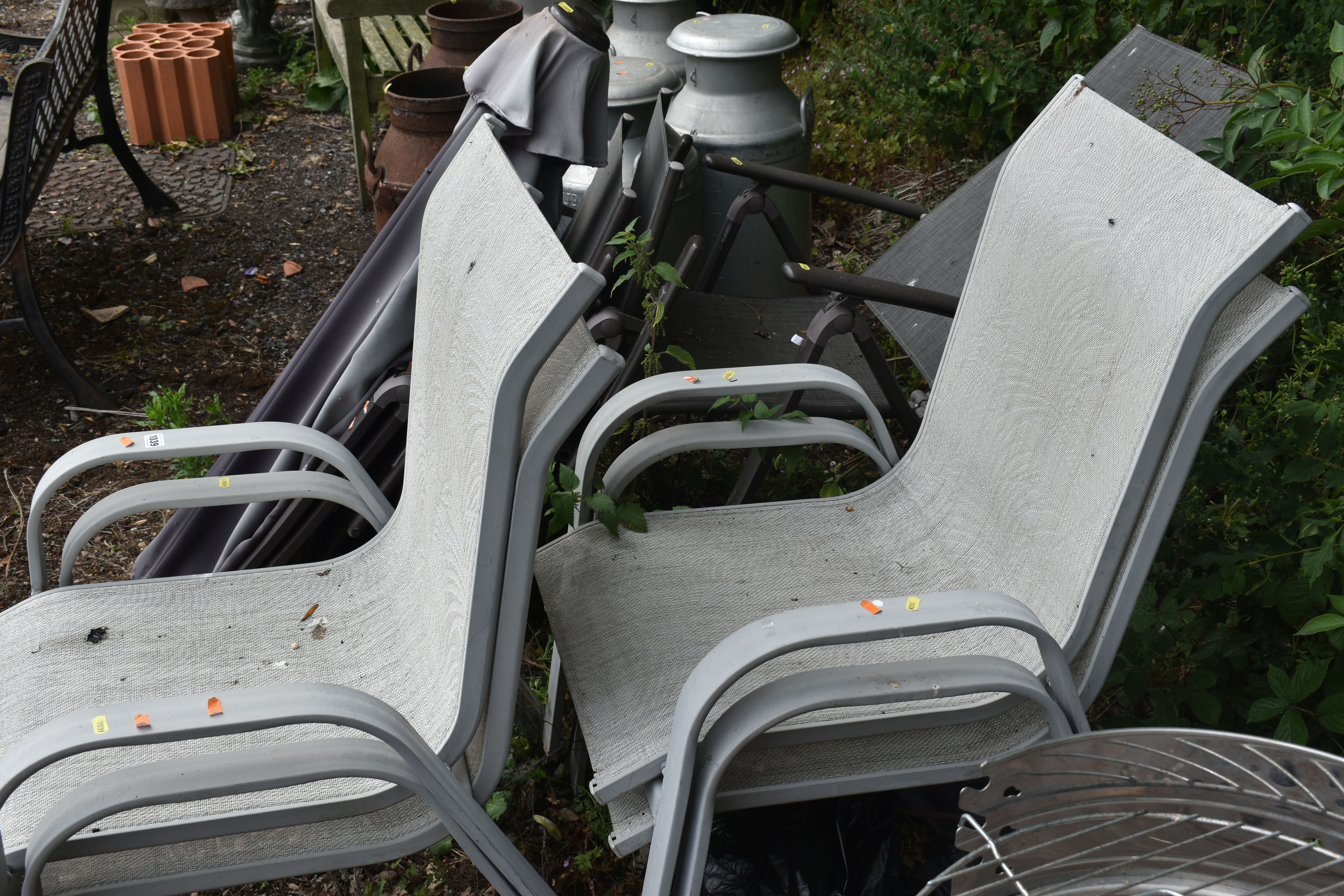 A SET OF FOUR FOLDING GARDEN CHAIRS, along with a parasol and a set of four cream stacking garden - Image 3 of 3