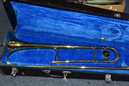 A CASED JUPITER TROMBONE, in brass and plated finish, with hard fitted case (1) (Condition Report: