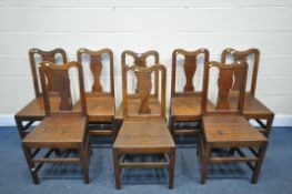 A SET OF EIGHT GEORGIAN OAK SPLAT BACK CHAIRS (condition report: - historical wear and tear