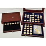 A GLAZED BOXED SET OF ENHANCED KENNEDY HALF DOLLAR COINS, to include gold highlighted with