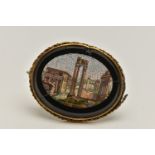 A LATE 19TH CENTURY MICRO MOSAIC BROOCH, depicting the Temple of Vespasian, set in yellow metal with