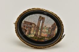 A LATE 19TH CENTURY MICRO MOSAIC BROOCH, depicting the Temple of Vespasian, set in yellow metal with