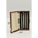 A CASED SET OF FOUR WHITE METAL PROPELLING BRIDGE CARD GAME PENCILS, each pencil stamped 'Sterling',