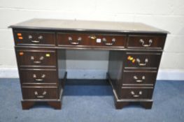 A 20TH CENTURY MAHOGANY TWIN PEDESTAL DESK, with a green and tooled leather writing surface and