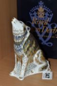 A BOXED ROYAL CROWN DERBY 'WOLF' PAPERWEIGHT, with gold stopper, date cypher 2010, painted and