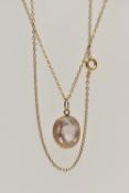 A 9CT GOLD GEM SET PENDANT AND CHAIN, oval cut smoky quartz collet set with a fine rope twist