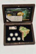 A CASED SET CONTAINING SMALL .999 GOLD, 0.5 gram 2020 Burundi 50 francs coins featuring South