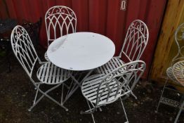 A WHITE PAINTED FOLDING ALUMINIUM GARDEN FIVE PIECE BISTRO SET, comprising a circular table,