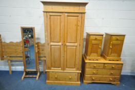 A PINE DOUBLE DOOR WARDROBE, with a single drawer to base, width 97cm x depth 61cm x height 200cm, a