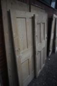 FIVE VARIOUS PINE DOORS, of various shapes, sizes and ages, largest width 86cm x height 195cm (