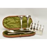 AN ASSORTMENT OF SILVER ITEMS, to include a cased christening set, a spoon and fork, hallmarked '