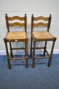 A PAIR OF OAK RUSH SEATED BAR STOOLS, height 104cm (condition - minor signs of use) (2)