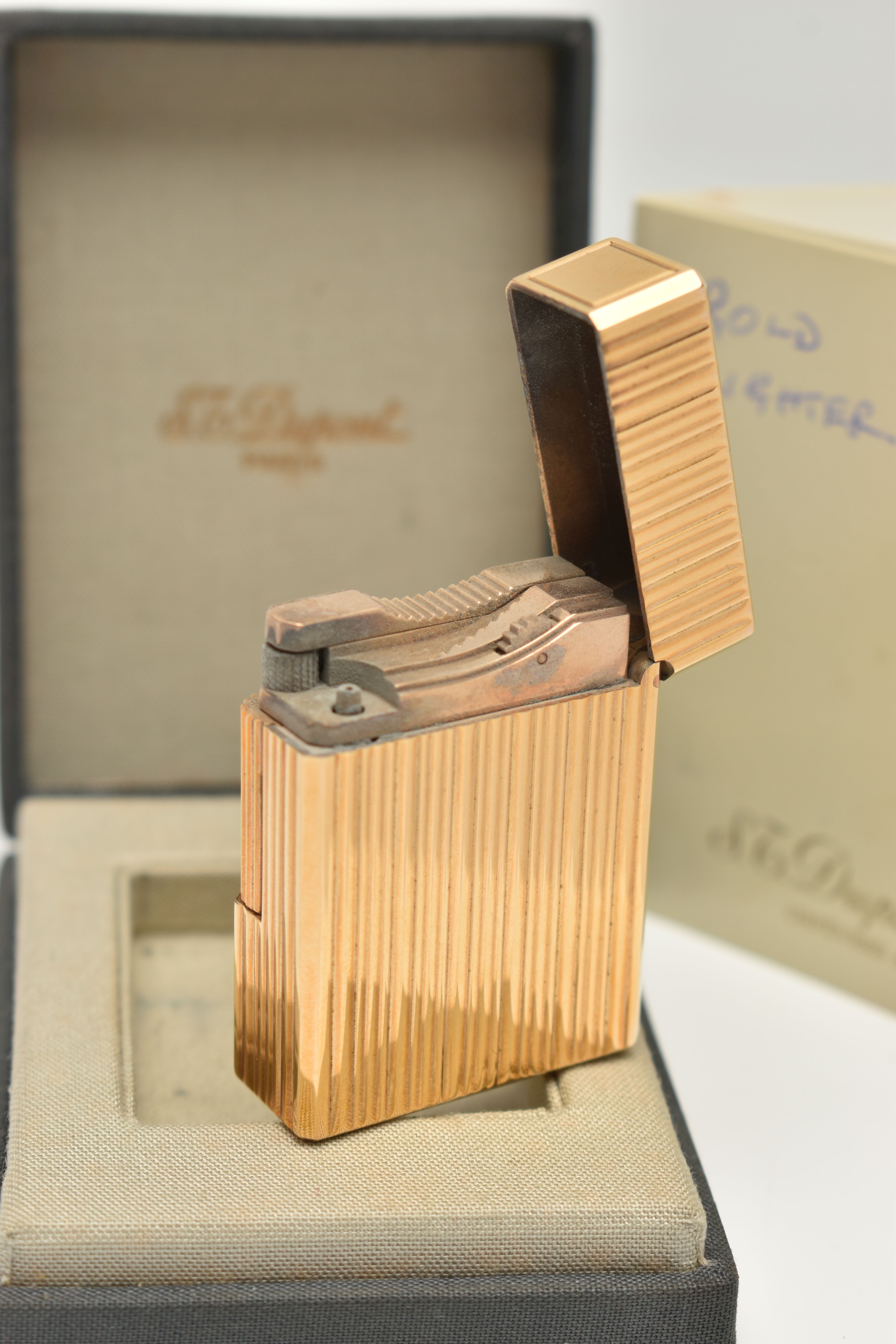 A 'S.J.DUPONT' LIGHTER, a signed gold plated lighter, encased in a signed box also including an - Image 2 of 3