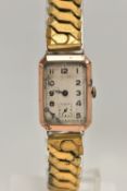 A GENTS 9CT GOLD WRISTWATCH, manual wind, rectangular textured silver dial, Arabic numerals,