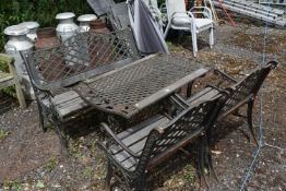 A CAST IRON AND WOODEN FOUR PIECE GARDEN SUITE, comprising a table, with rose detail to each end,