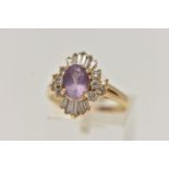 A AMETHYST AND DIAMOND CLUSTER RING, principally set with an oval cut amethyst, ten round