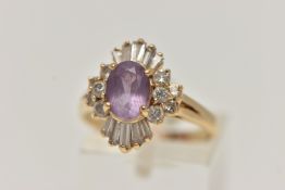 A AMETHYST AND DIAMOND CLUSTER RING, principally set with an oval cut amethyst, ten round