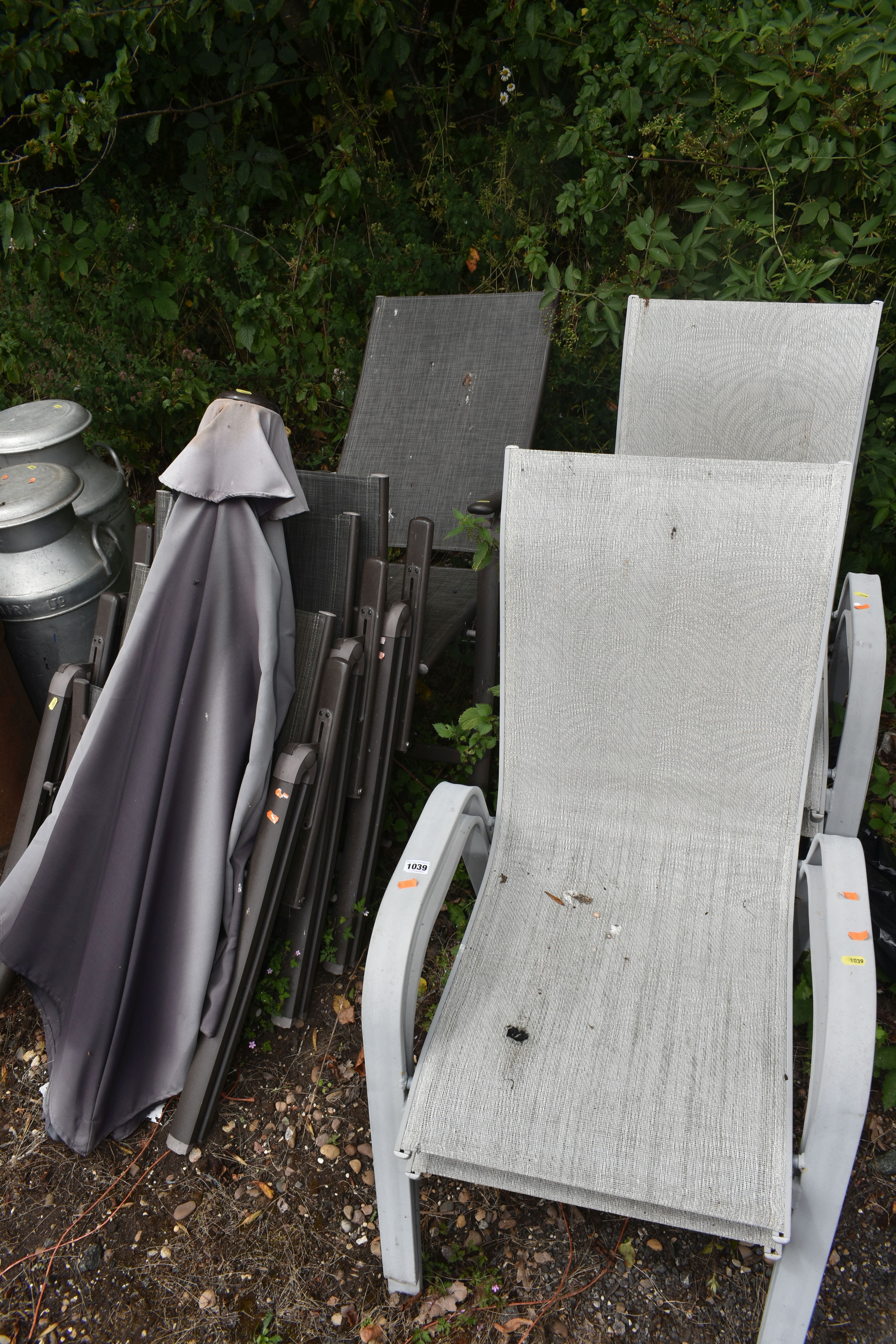 A SET OF FOUR FOLDING GARDEN CHAIRS, along with a parasol and a set of four cream stacking garden - Image 2 of 3