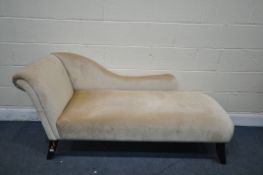 A BEIGE UPHOLSTERED CHAISE LOUNGE, length 169cm x depth 66cm x height 77cm (condition - signs of