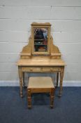 A MODERN PINE DRESSING TABLE, with a single swing mirror, four various drawers, width 92cm x depth