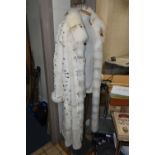 A MODERN FULL LENGTH REVERSIBLE LADIES FUR COAT, UK size 12/14, light brown suede on one side and