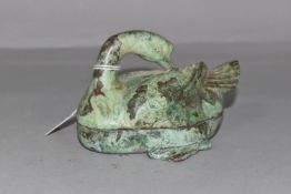 A CAST BRONZE POT IN THE FORM OF A SWAN, preening its feathers, very heavy, length 13cm x height 8cm